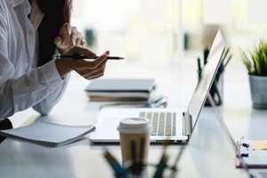 business woman or accountant making working audit with her team