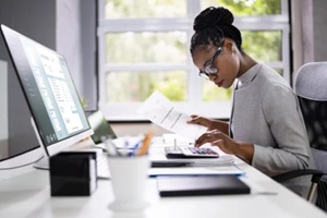 accountant using electronic invoice or bill