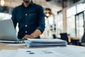 view of modern office, workspace or coworking during work time on a sunny morning