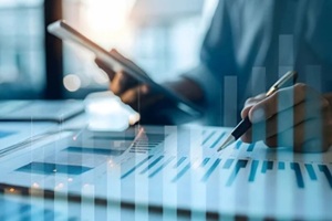 tour guide negotiating tour rates on reality background concept as Tour guide negotiating tour rates with suppliers using documents and a tablet on a reality background representing the marginal cost